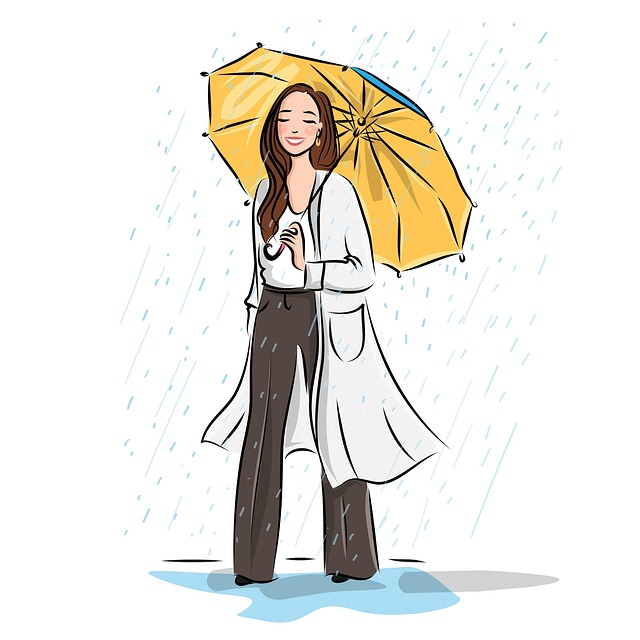 雨の中、カメラを構える人物のシルエット
